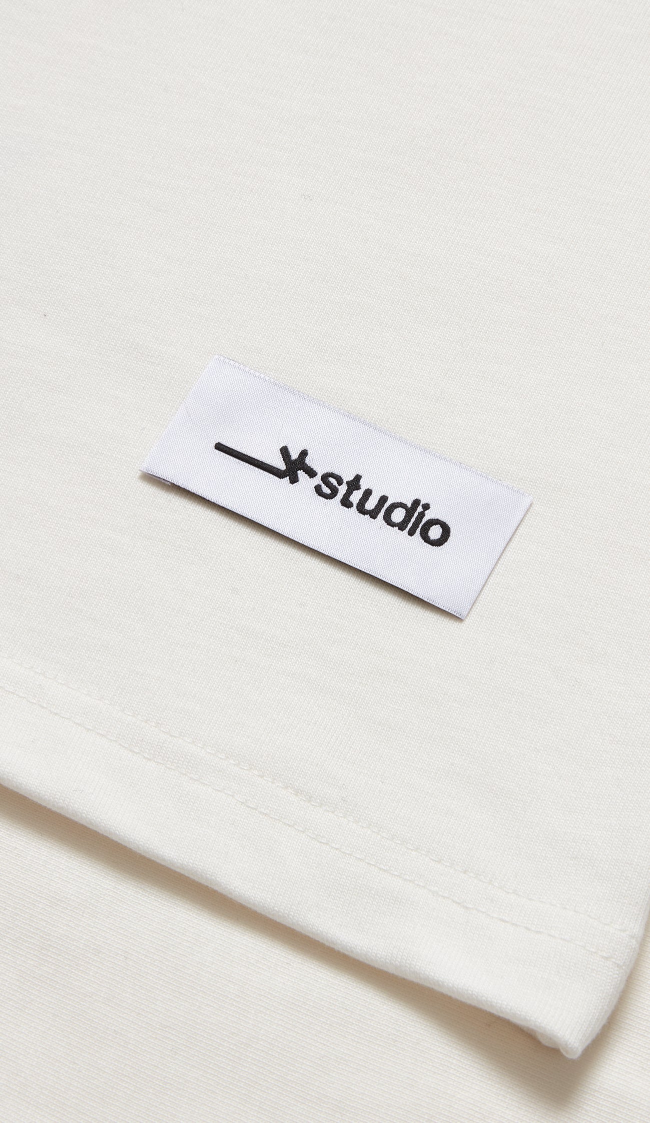 BASICS T A/W 25 - Ecru